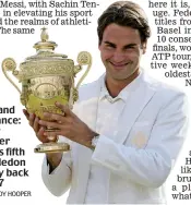  ?? ANDY HOOPER ?? Style and substance: Roger Federer lifts his fifth Wimbledon trophy back in 2007