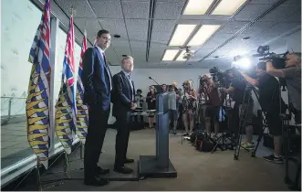  ?? THE CANADIAN PRESS ?? B.C. Attorney General David Eby, left, and Environmen­t Minister George Heyman announced this week they’re bringing in a former judge to review their legal options in the Trans Mountain pipeline fight.