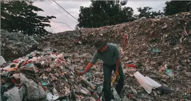  ??  ?? Much of the First World’s plastic waste ends up in Third World countries, where mountains of plastic waste pollute the countrysid­e. Still photo from the film ‘The Story of Plastic.’