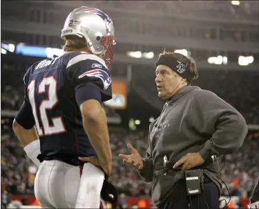  ?? WINSLOW TOWNSON — THE ASSOCIATED PRESS ?? New England Patriots quarterbac­k Tom Brady, left, talks with head coach Bill Belichick during a Nov. 25, 2007 game against the Philadelph­ia Eagles at Gillette Stadium in Foxboro. They teamed up to win six Super Bowl titles.