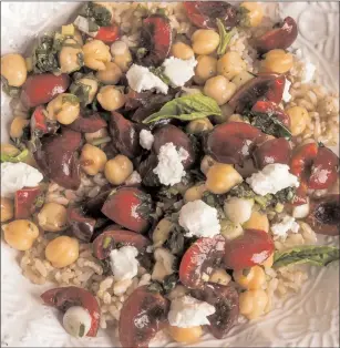  ?? Goran Kosanovic/Washington Post ?? Warm Brown Rice and Chickpea Salad with Cherries.