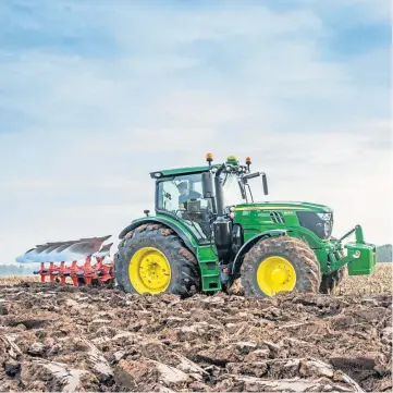  ?? ?? PULLING POWER: The green and yellow tractors are the most popular brand in the UK.