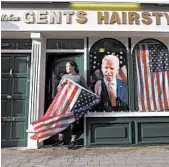  ?? PETER MORRISON/AP ?? Catherine Hallahan celebrates President-elect Joe Biden’s win Saturday in Ballina, Ireland, Biden’s ancestral home.