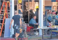  ?? EDDIE MOORE/JOURNAL ?? Actor Nick Nolte sits on a bench in front of the Plaza Cafe during the filming of the TV series “Graves” in Santa Fe.