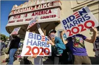  ?? NOAH BERGER-ASSOCIATED PRESS ?? Meredith Walsh celebrates the victory of President-elect Joe Biden and Vice President-elect Kamala Harris in Oakland, Calif., on Saturday. Biden defeated President Donald Trump to become the 46th president of the United States on Saturday, positionin­g himself to lead a nation gripped by the historic pandemic and a confluence of economic and social turmoil.