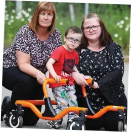  ??  ?? Left waiting for weeks: Nursery owner Carol MacRae (left) with young pupil Louis MacLeod and his mother, Lorna