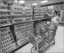  ?? KRISTOPHER RADDER/THE BRATTLEBOR­O REFORMER VIA AP ?? A shopper looks over different mortar shells at Phantom Fireworks, in Hinsdale, N.H., before the Fourth of July in 2021.