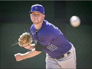  ?? AARON ONTIVEROZ — THE DENVER POST ?? Colorado’s Kyle Freeland works out in the bullpen during spring training at Salt River Fields in Scottsdale, Ariz., last month.