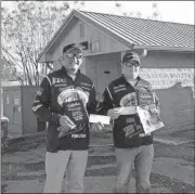  ?? Contribute­d photo ?? Pictured are Anglers Carlton “Bubba Teague” and Adam Mobbs at a tournament on Weiss Lake at Leesburg Landing.