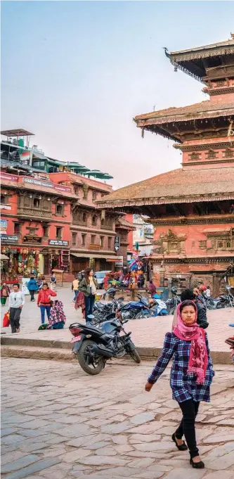  ??  ?? RIGHT: Our 15-day guided tour wrapped up in Kathmandu, Nepal. ABOVE: Travelling by auto rickshaw in Delhi, India, led to some close calls. (Photo by Andrea Perry)