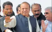  ??  ?? Former Pakistan prime minister Nawaz Sharif waves to supporters at a rally in Muridke on Saturday.
