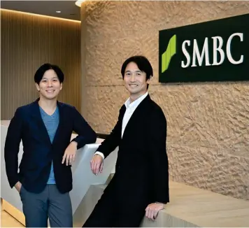  ?? ALBERT CHUA/THE EDGE SINGAPORE ?? Masaki Adachi, vice president of SMBC’s Digital Strategy department (left), and Keiji Matsunaga, SMBC head of Asia Innovation Centre