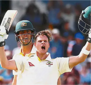  ?? — Reuters ?? In fine form: Australia captain Steve Smith celebratin­g with teammate Mitchell Marsh after reaching his double century during the third day of the third Ashes Test match yesterday.