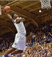  ?? GRANT HALVERSON / GETTY IMAGES ?? “For somebody like me, coming down on a fast break, an in-and-out crossover, and that moment where I jump and glide to the rim and lay it in, for me, it’s like poetry in motion. I feel like I was in slow motion, and it’s just poetry,” says Duke forward Zion Williamson.