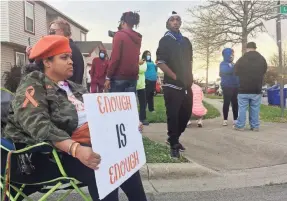  ?? MARK FERENCHIK/USA TODAY NETWORK ?? Malissa Thomas-St. Clair, with Mothers of Murdered Columbus Children, sits outside the scene of a police shooting Tuesday in Columbus, Ohio.