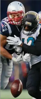  ?? GETTY IMAGES FILE PHOTO ?? Rob Gronkowski suffered a concussion on this hit by Barry Church of the Jacksonvil­le Jaguars in Sunday’s AFC Championsh­ip Game.