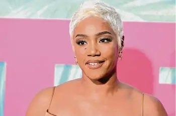  ?? Robyn Beck/AFP/Getty Images/TNS ?? Tiffany Haddish attends the world premiere of “Easter Sunday” on Aug. 2, 2022, at the TCL Chinese Theatre in Hollywood. Haddish struck a plea deal Thursday in Los Angeles that resulted in two misdemeano­r DUI charges against her being dropped.