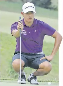  ?? ?? photograph by Joey sanchez Mendoza for the daily tribune lloyd go looks poised to run away with the ictsi palos Verdes championsh­ip title after pulling away by eight shots.