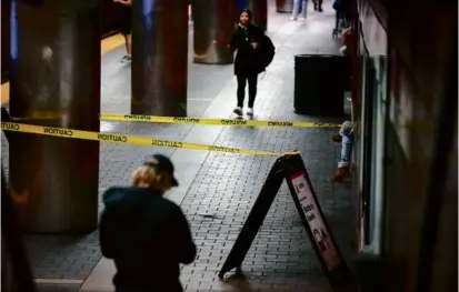  ?? NATHAN KLIMA/GLOBE STAFF ?? A utility box became dislodged at the MBTA Harvard Square Red Line station on the inbound platform and struck a passenger in early May.