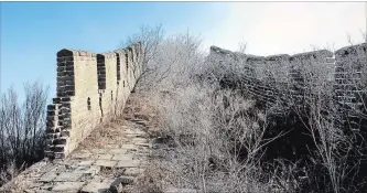  ??  ?? The more popular Great Wall sites receive millions of visitors per year. In others, nature has overtaken the structure.