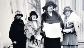  ??  ?? > Women’s Petition for Peace petition pictured in America in 1924