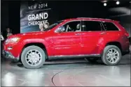  ??  ?? The 2014 Jeep Grand Cherokee was unveiled along with siblings Patriot and Grand Cherokee SRT.