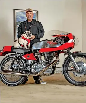  ??  ?? Billy Joel with his Royal Enfield Bullet 500 — and one of his pugs