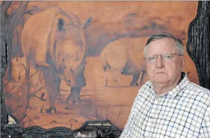  ?? ?? Flawed economic model: White rhino (above), which have been dehorned to prevent poaching, graze on a game reserve in Limpopo. Trimmed rhino horns (left) are weighed, measured and marked, at the ranch of former rhino breeder John Hume (above). Photos: Kevin Sutherland/getty Images, Leon Neal/getty Images & Jürgen Bätz/ Getty Images