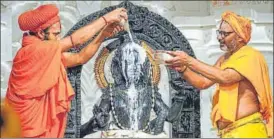  ?? ANI PHOTO ?? Priests perform ‘Divya Abhishek’ of the idol of Lord Ram Lalla on the occasion of Ram Navami, at Ram Temple in Ayodhya on Wednesday.