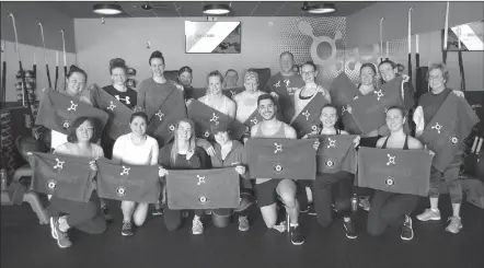  ?? Herald photo by Tim Kalinowski ?? Orange Theory Fitness was sweating and crunching on Saturday to raise money for Augie’s Quest, a campaign dedicated to finding a cure for ALS, also known as Lou Gehrig’s disease. Orange Theory was able to reach its goal of raising over $4,000 locally.