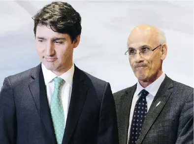  ?? SEAN KILPATRICK / THE CANADIAN PRESS ?? Prime Minister Justin Trudeau and Clerk of the Privy Council Michael Wernick attend a swearing-in ceremony Friday.