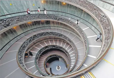  ?? REUTERS ?? People visit the Vatican Museums on Monday as the Vatican reopened following the easing of Covid-19 restrictio­ns.
