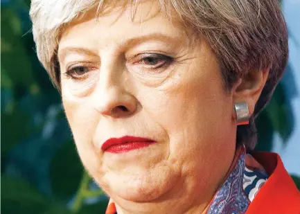  ??  ?? British PM Theresa May is trying to discipline her fractious Cabinet after last month’s election setback undermined her leadership. (AP)