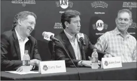  ?? KARL MONDON/STAFF ?? Giants CEO Larry Baer, from left, general manager Bobby Evans and manager Bruce Bochy struck an upbeat tone Monday. Baer also said the team’s payroll would rise slightly.