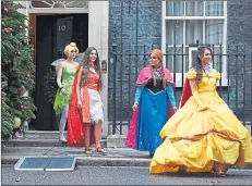  ??  ?? The Cabinet leave Downing Street after a meeting with PM Theresa May...or possibly a charity visits last week