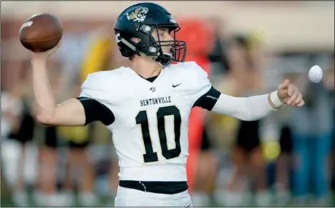  ?? NWA Democrat-Gazette File Photo/ANDY SHUPE ?? Bentonvill­e quarterbac­k Ben Pankau passes Sept. 27 during the first half of play against Springdale Har-Ber at Wildcat Stadium in Springdale.