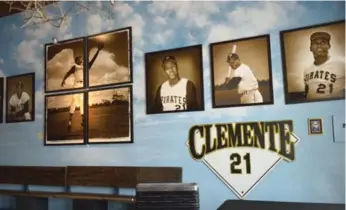  ?? KEVIN OKE PHOTOGRAPH­Y ?? Pittsburgh’s most famed baseball player, Roberto Clemente, has his own museum. Every sport of importance in the city is showcased in the building, a converted 1925 firehouse.