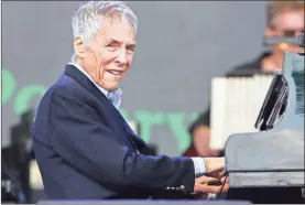  ?? Yui Mok/Pa Wire/abaca Press/Tns ?? Burt Bacharach performs during the Glastonbur­y Festival in Somerset, England, in 2015. Bacharach died last week at age 94.