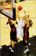  ?? MARK HUMPHREY ENTERPRISE-LEADER ?? Prairie Grove sophomore Lexie Madewell gets off a shot in front of the rim. Madewell drew a foul in the Lady Tigers’ 44-37 home court loss to Gravette Dec. 13.