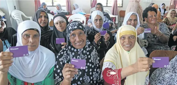  ?? Photo: Ronald Kumar ?? Happy with the free bus fare news (front, from left) Merul Nisha, 64, Jaitun Nisha, 72, Bano, 72, (back, from left) Nur Bano, 65, Saira Bano, 69, Jamida Bi, 60, Hafisan Bibi, 73, with Akesa Ulamila, 57, during Senior Citizen week celebratio­n organised by Fiji Muslim League in Makoi on October 4, 2018.