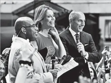  ?? STEPHEN LOVEKIN/GETTY ?? Matt Lauer, center, hosts NBC’s “Today” in 2013 with Al Roker, left, and Savannah Guthrie. This week, when Lauer was fired after being accused of “inappropri­ate sexual behavior,” Guthrie said: “How do you reconcile your love for someone with the...