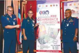  ?? BERNAMAPIX ?? From left: JPBM assistant directorge­neral training division Muhammad Hamdan Wahid, Wan Mohd Nor and deputy directorge­neral (operations) Datuk Soiman Jahid at the soft launch yesterday.