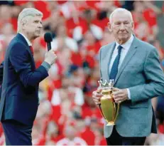  ??  ?? Arsenal manager Arsene Wenger and Bob Wilson after the match. — Reuters