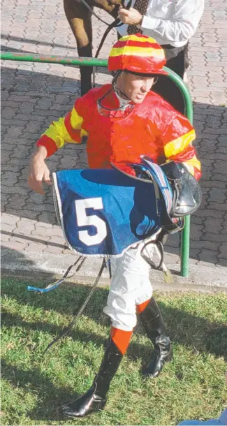  ?? Picture: Fiona Harding ?? North Queensland jockey Robert Warren at Cluden Park.