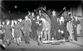  ??  ?? Crowds in Bristol celebrate VE Day in 1945