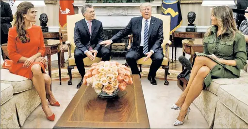  ??  ?? AMIGOS: President Trump and First Lady Melania meet at the White House Thursday with Argentine President Mauricio Macri and wife Juliana Awada. Things got sour, then sweet, when a reporter brought up a US ban on Argentinia­n lemons. “We’re going to be...