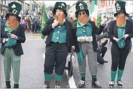  ?? (Pic: C ?? These fine leprechaun­s caused a stir in Fermoy on St Patrick’s Day. Sheehan)