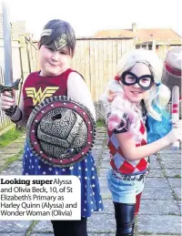  ??  ?? Looking superalyss­a and Olivia Beck, 10, of St Elizabeth’s Primary as Harley Quinn (Alyssa) and Wonder Woman (Olivia)