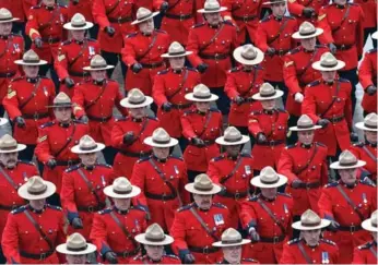  ?? RENÉ JOHNSTON/TORONTO STAR FILE PHOTO ?? The RCMP is the only police force in Canada that is not unionized. A bill to allow unionizati­on is under review.