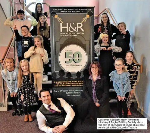  ?? ?? Customer Assistant Holly Towe from Hinckley & Rugby Building Society visits the cast of The Sound of Music at a recent rehearsal at the Concordia Theatre.